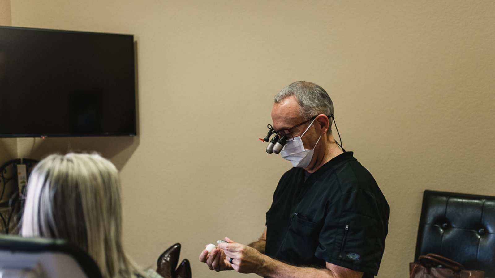Dr. David Crumpton talking with a patient at Complete Dentistry