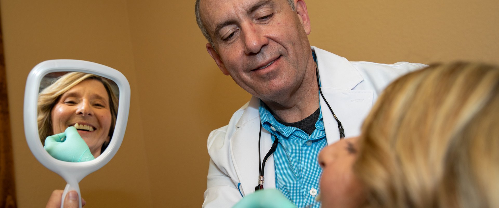 Dr. David Crumpton with a patient at Complete Dentistry in Trophy Club